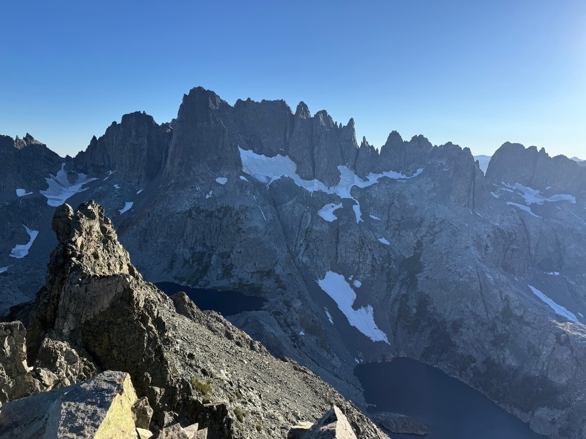 The jagged Minarets and Volcanic Ridge towering above dark alpine lakes
